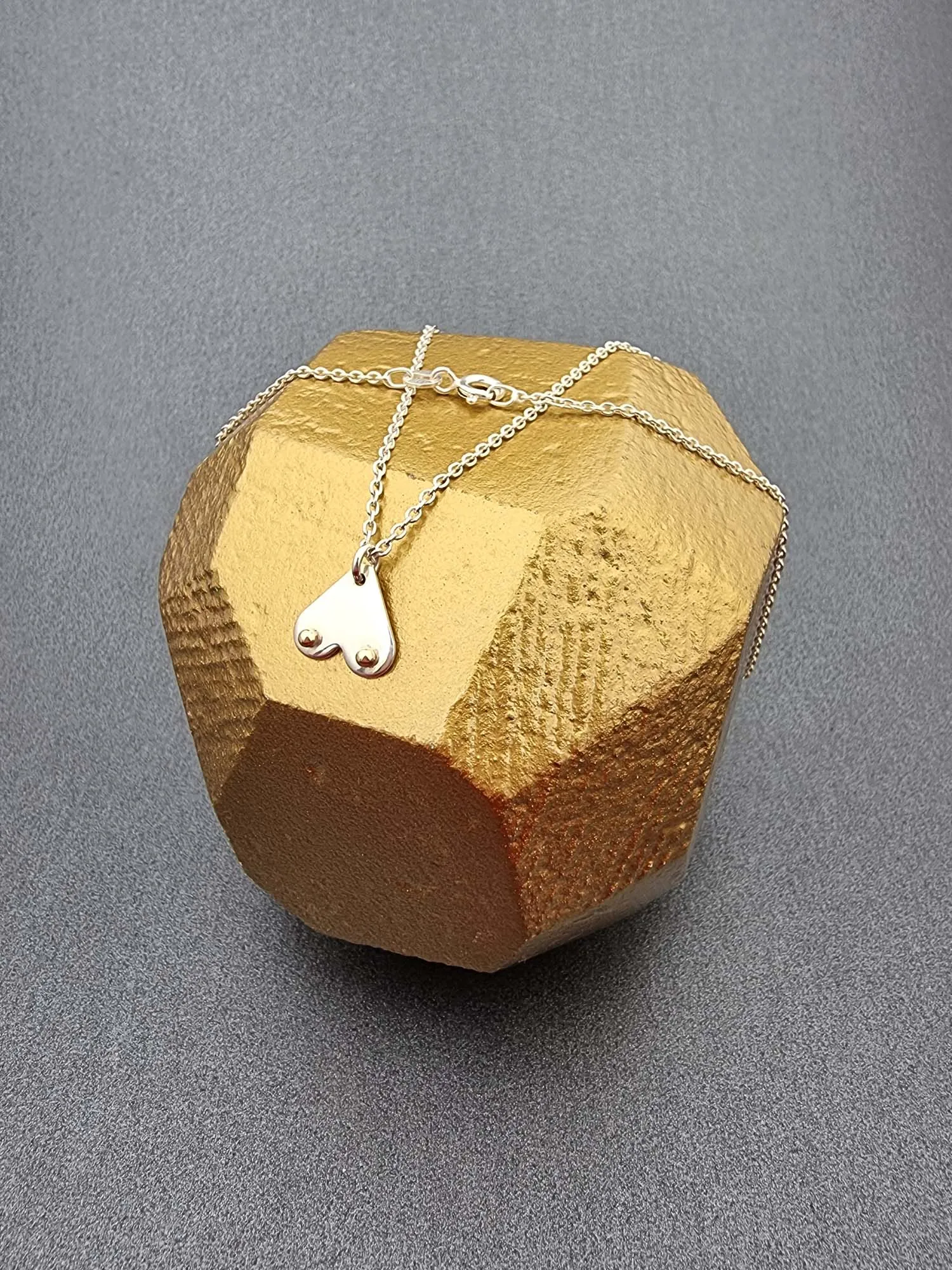 A BREAST FRIENDS - silver with 9ct gold necklace