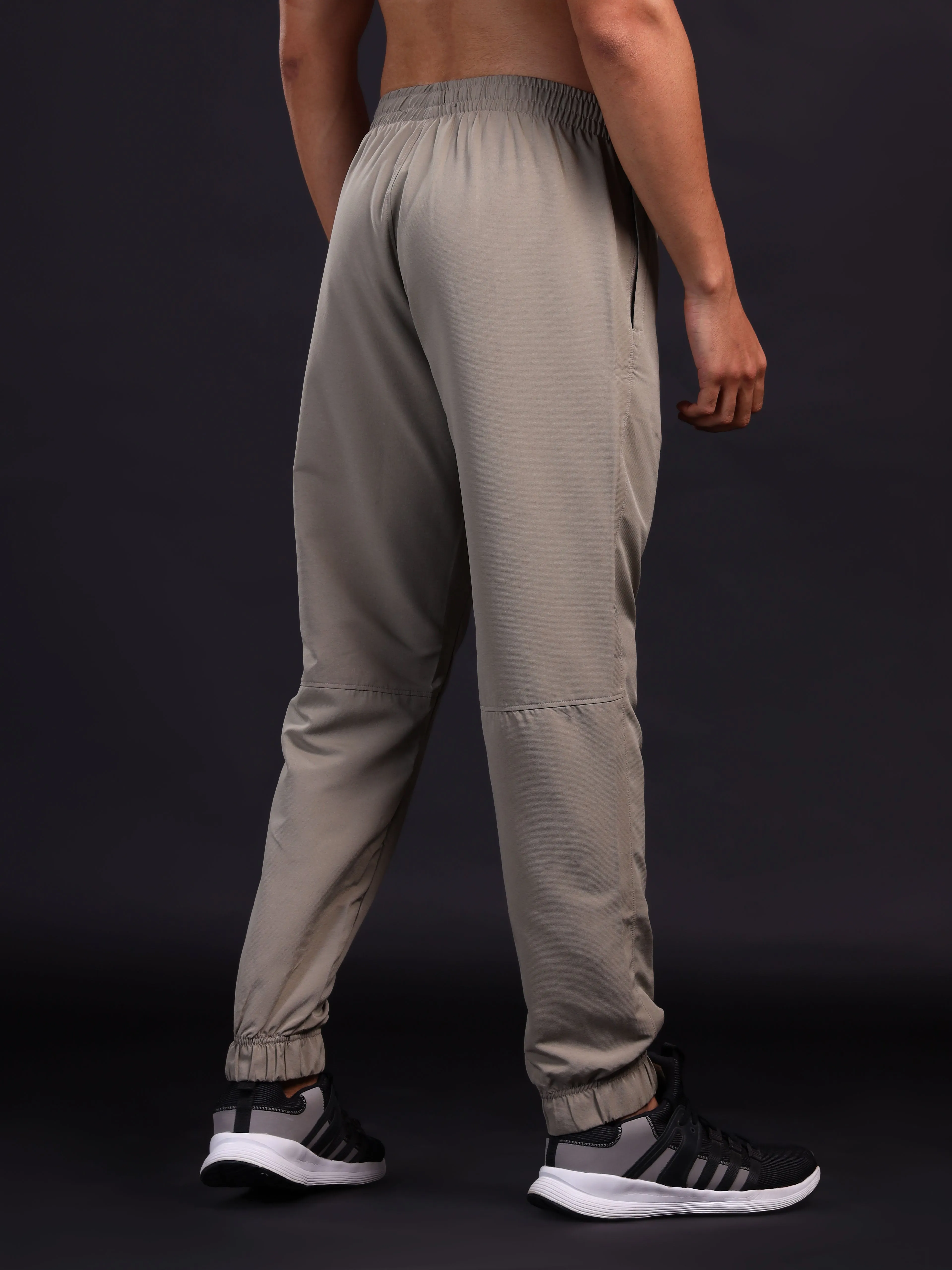 Men Solid Relax Fit Joggers with TECHNOLITE