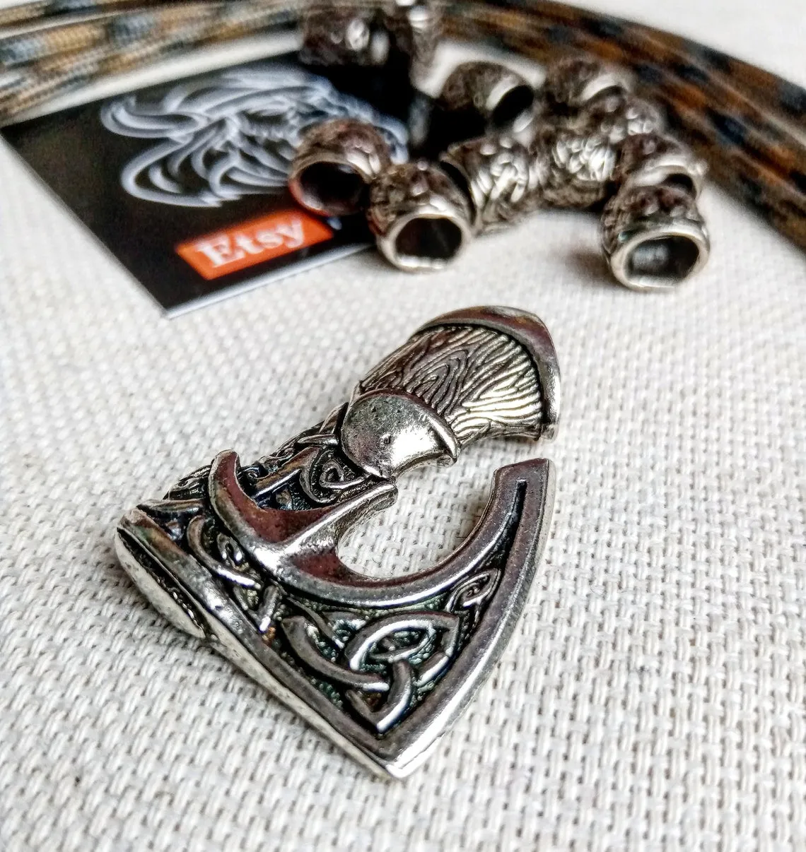 Set for weaving a bracelet from paracord.  DIY gift.  Do it yourself. Celtic  bracelet  with a paracord, clasp ax.  Viking style.