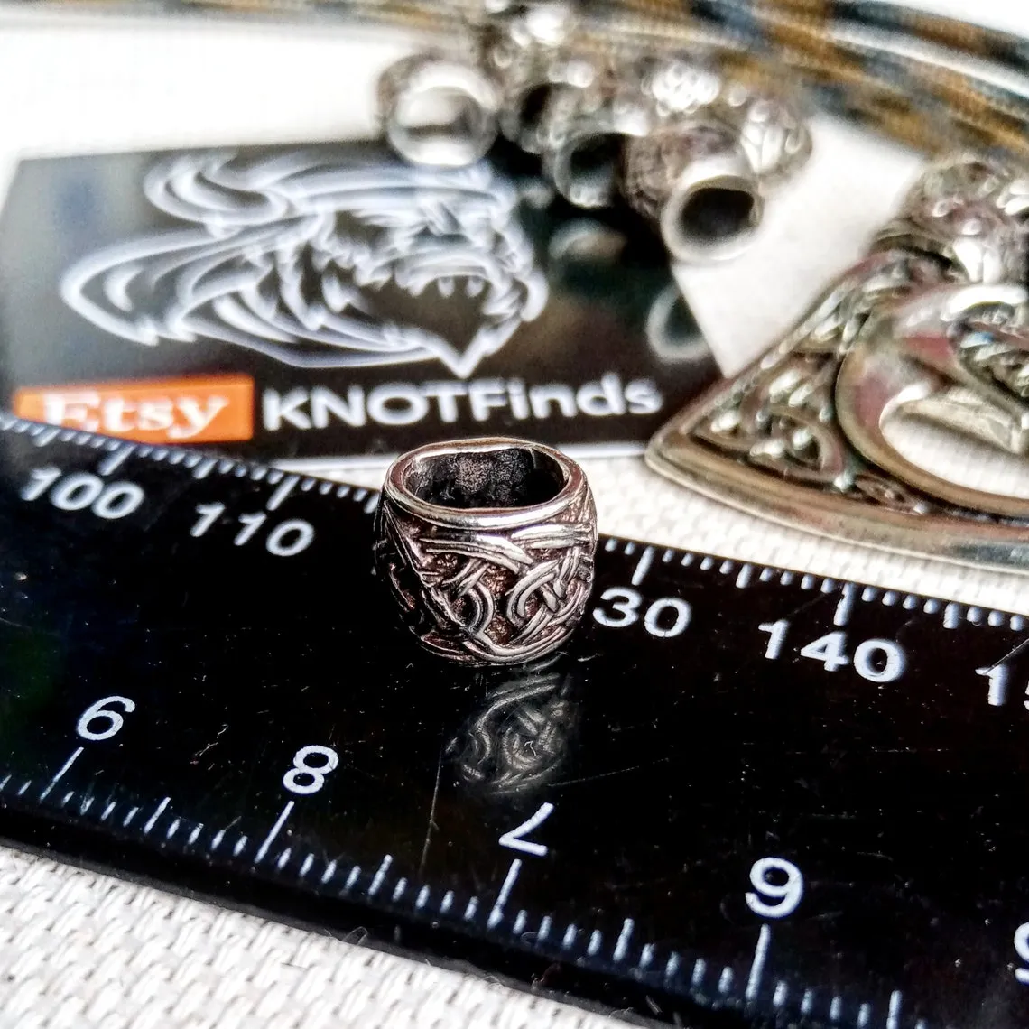 Set for weaving a bracelet from paracord.  DIY gift.  Do it yourself. Celtic  bracelet  with a paracord, clasp ax.  Viking style.