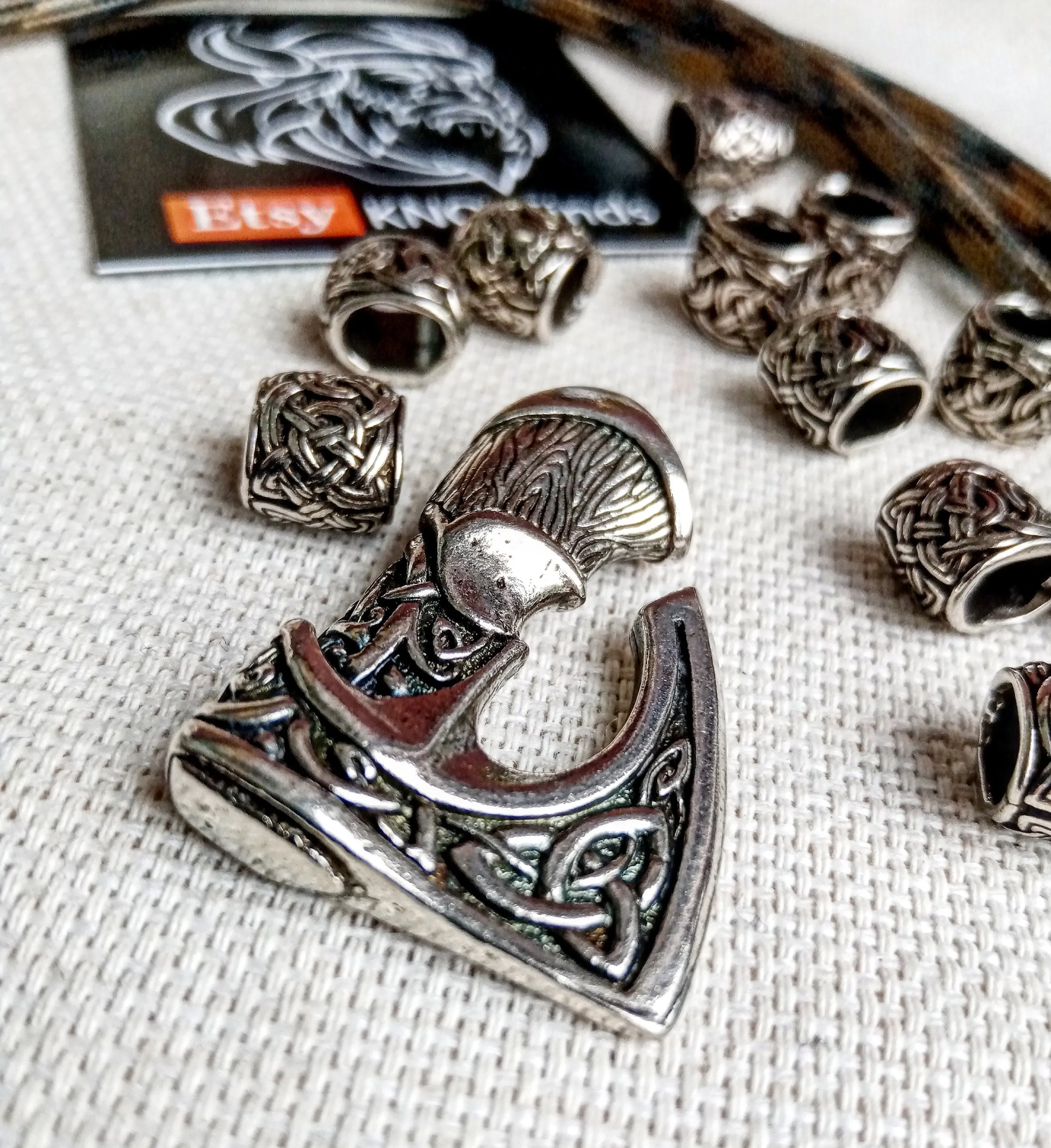 Set for weaving a bracelet from paracord.  DIY gift.  Do it yourself. Celtic  bracelet  with a paracord, clasp ax.  Viking style.