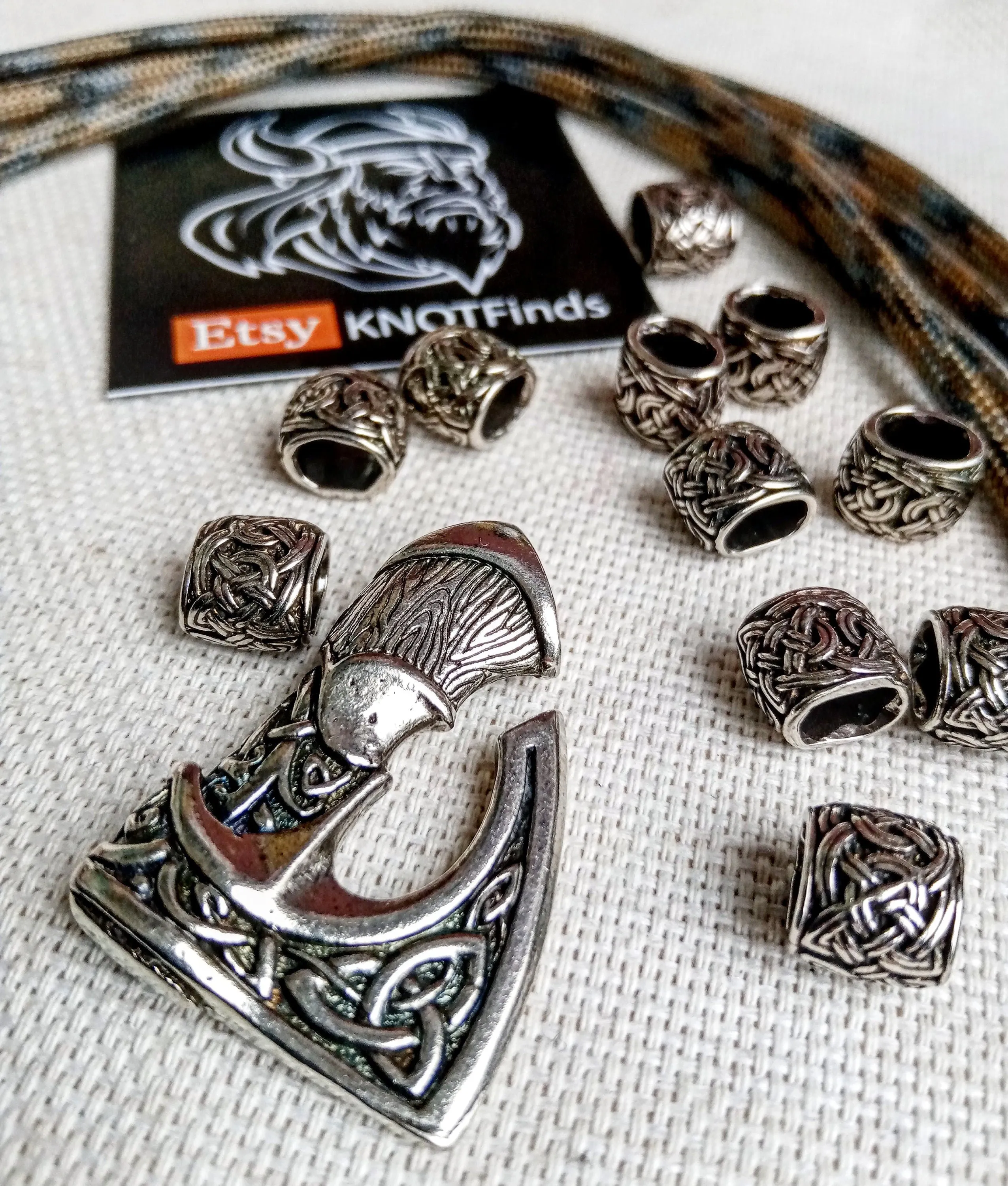 Set for weaving a bracelet from paracord.  DIY gift.  Do it yourself. Celtic  bracelet  with a paracord, clasp ax.  Viking style.