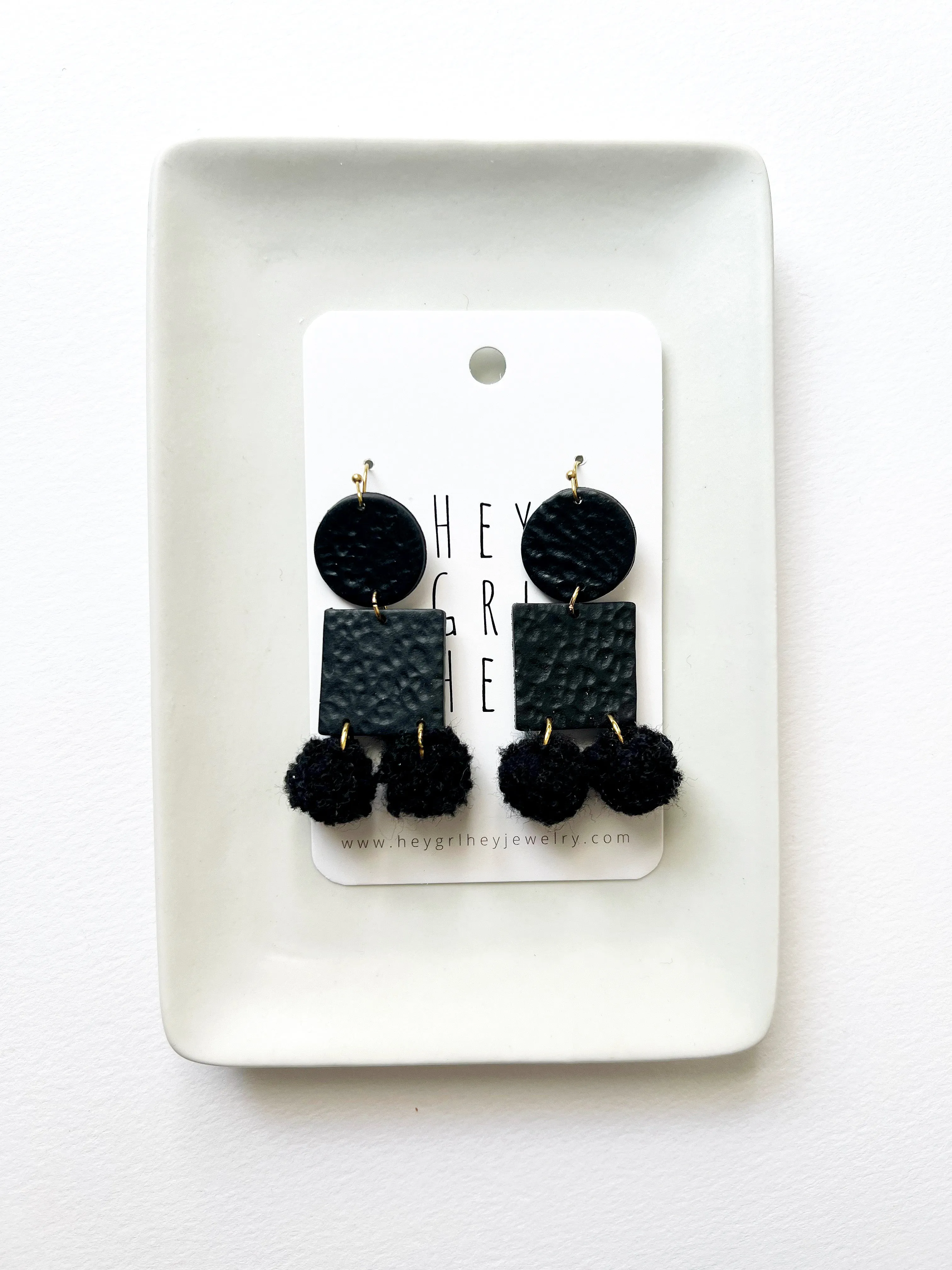 The Black Pom Pom Earrings