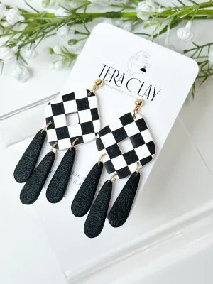 The Checkered Rhombus Dangles